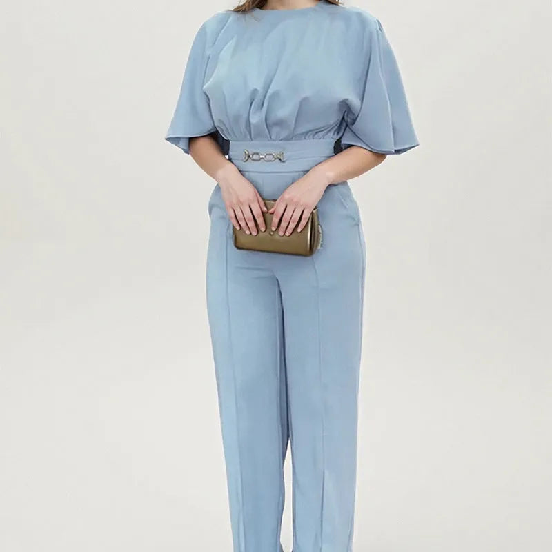 Blue men's polyester suit set with long sleeve blazer and trousers on hanger