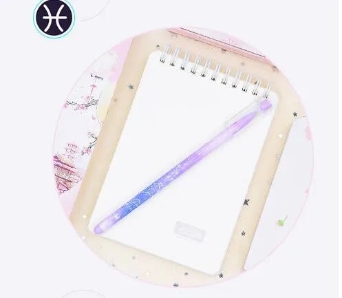 Box of 12 quick-drying gel pens with constellation designs and plastic bodies