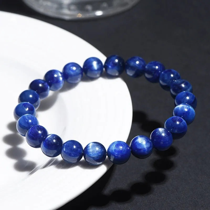 Natural blue crystal ball bracelet with spherical beads and traditional Ruyi charm, available in multiple sizing options