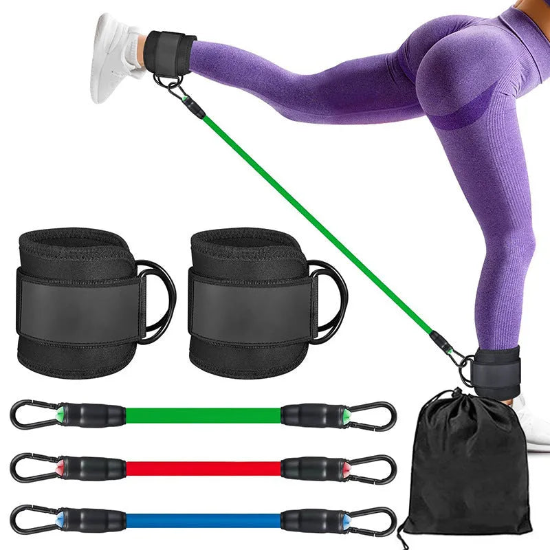 Three TPE resistance bands in different colours with foot loops and storage bag for hip and leg exercises