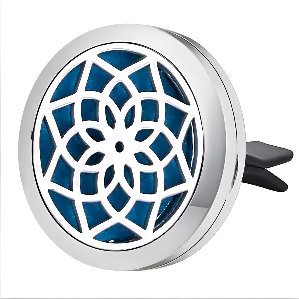 Round stainless steel car air vent perfume clip with polished finish, 30mm diameter, available in eleven steel colours and three patterns.