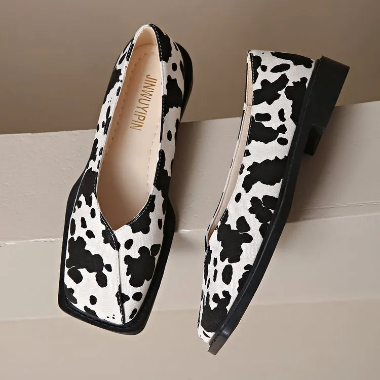 Women's cow pattern flat shoes with wedge heel in black and white, first layer cowhide upper