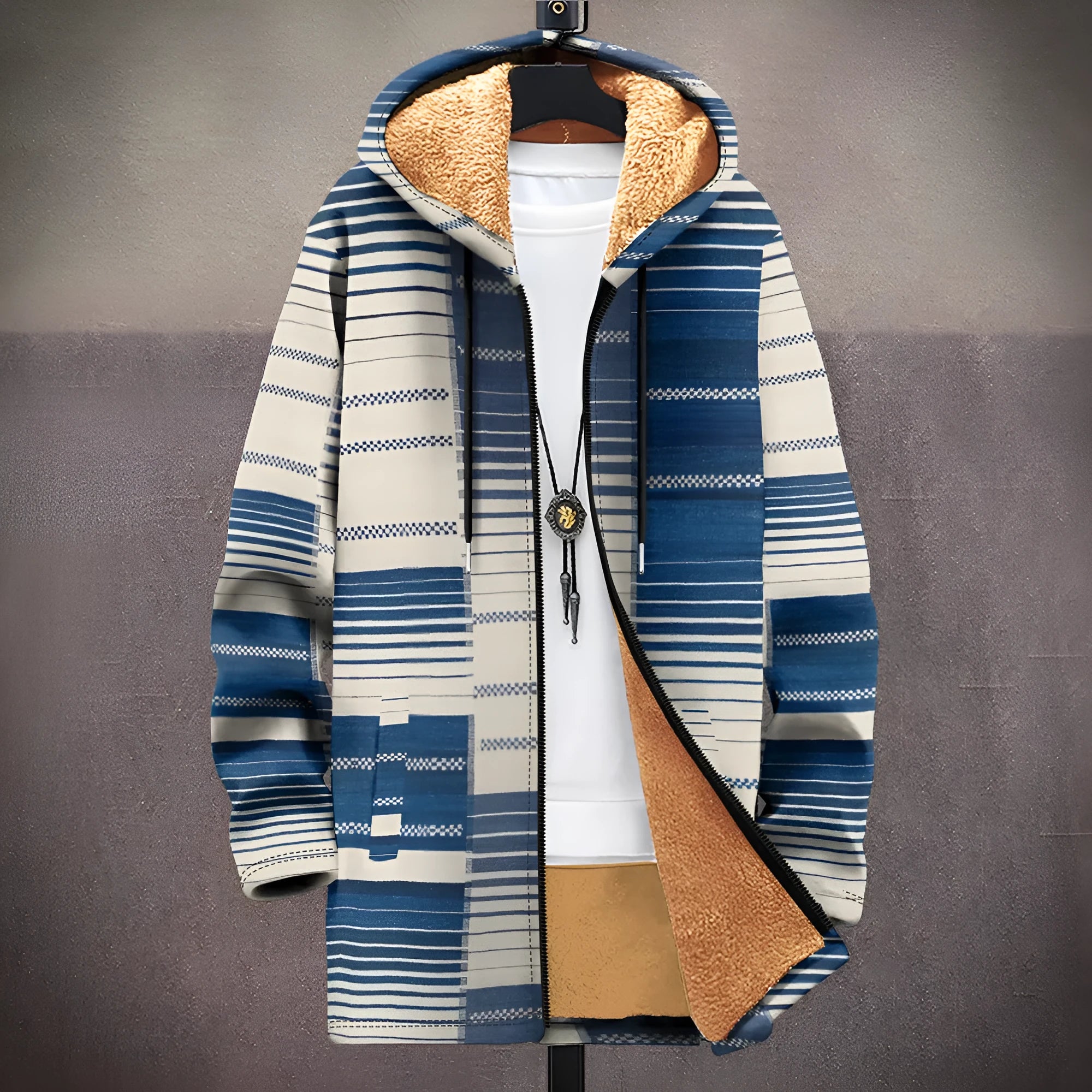 Man wearing a loose fit multicolour printed zip-up hooded cardigan in a casual setting