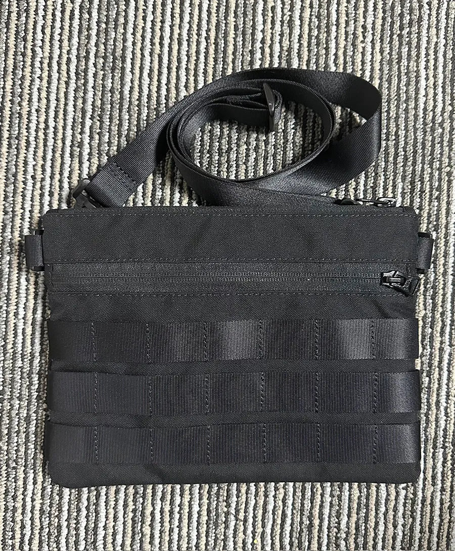 Black Oxford cloth portable military kit pouch with dimensions 18cm by 3.5cm