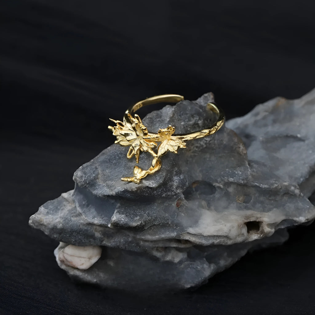 Silver butterfly ring with adjustable opening in gold-colour finish