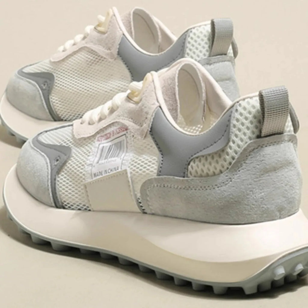 Women's grey and pink low-top retro sneakers with mesh lining and rubber sole