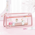 Transparent double-layer pencil case showing clear PVC construction with separate compartments