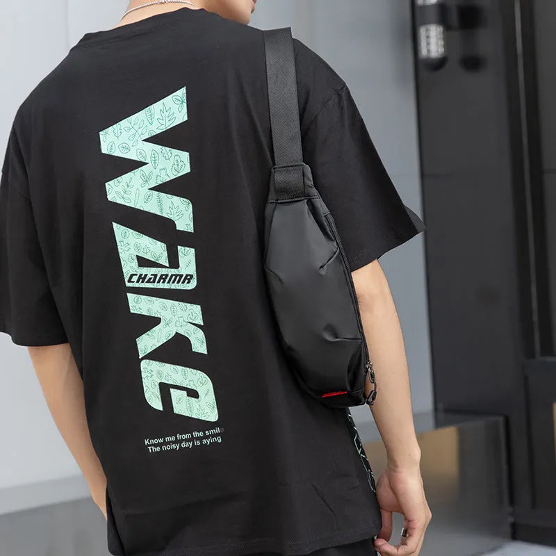 Black Oxford cloth waist pack showing multiple internal pockets including phone and ID compartments