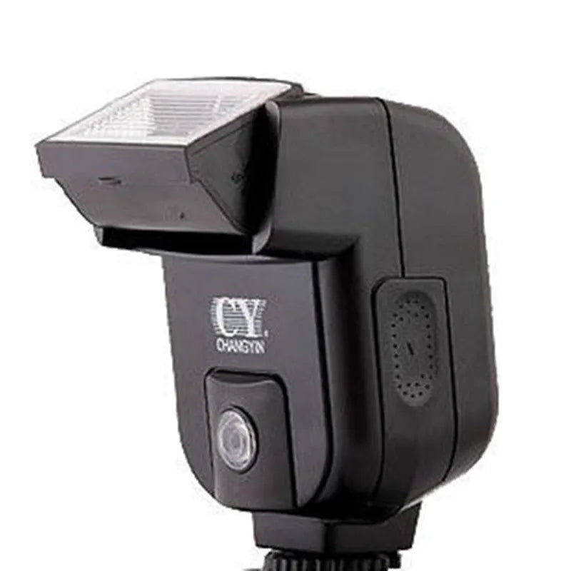 A compact black hot shoe flashgun for DSLR cameras, shown tilted upwards on its mount.