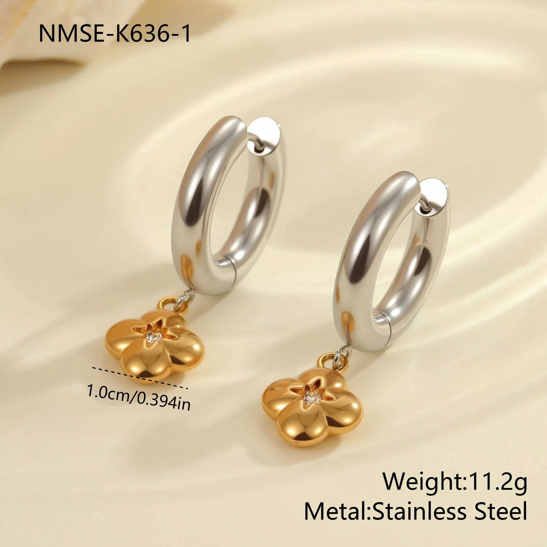 Christmas tree heart earrings in stainless steel with 18K gold plating showing star and geometric shapes