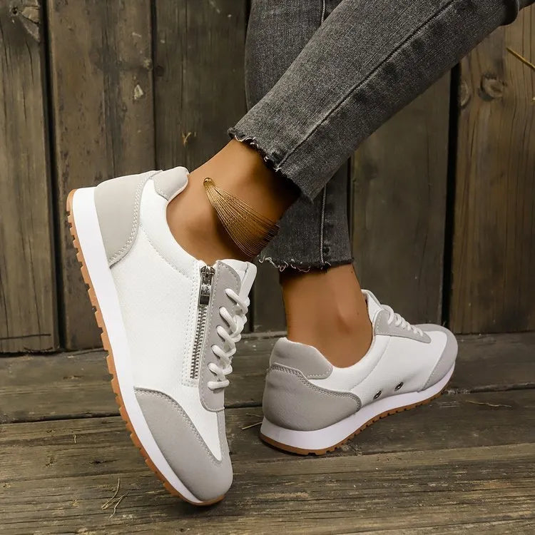 Women's flat-heeled shoes in grey, white, and champagne colours with rubber sole and PU upper
