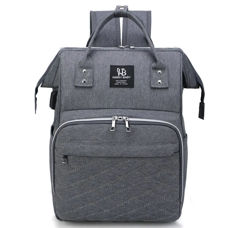 Large capacity USB rechargeable Oxford cloth baby diaper bag in blue with contrast grey trim, waterproof finish and double shoulder straps