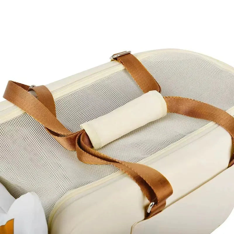 Beige hard-sided pet carrier with one shoulder strap measuring 43x25x22.5cm