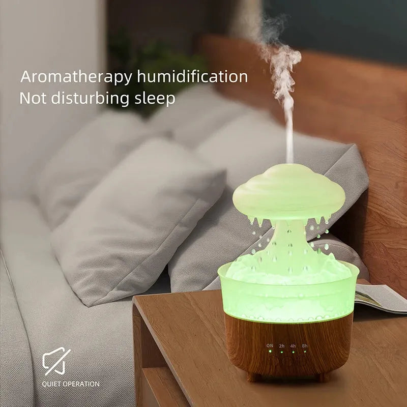 Wood grain white rain cloud shaped humidifier diffuser with LED night light on a table.