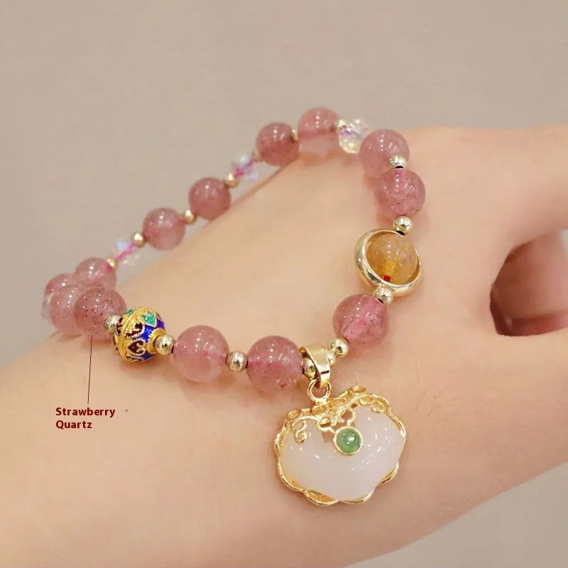 Geometric women's bracelet with ethnic metal decoration, available in Gray Jade or Strawberry Quartz.
