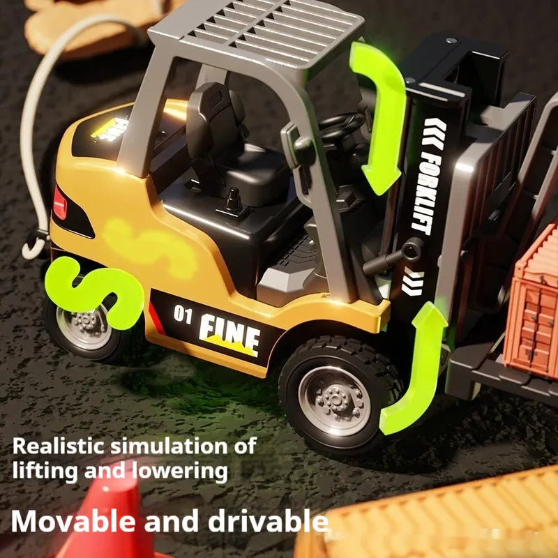 Remote control miniature alloy forklift on desk with remote control unit