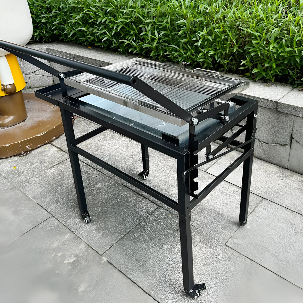Foldable charcoal barbecue stove with large grill shown in courtyard setting