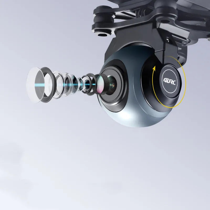 Plastic quadrocopter drone with GPS, remote controller, spare blades, and landing gear on grey background