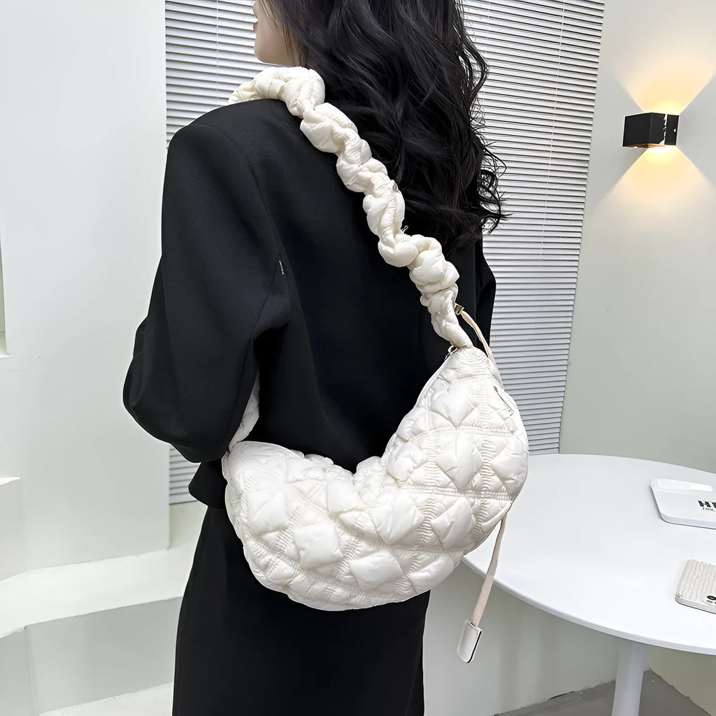 Women's simple nylon cloud underarm messenger bag in a solid colour with an adjustable shoulder strap.