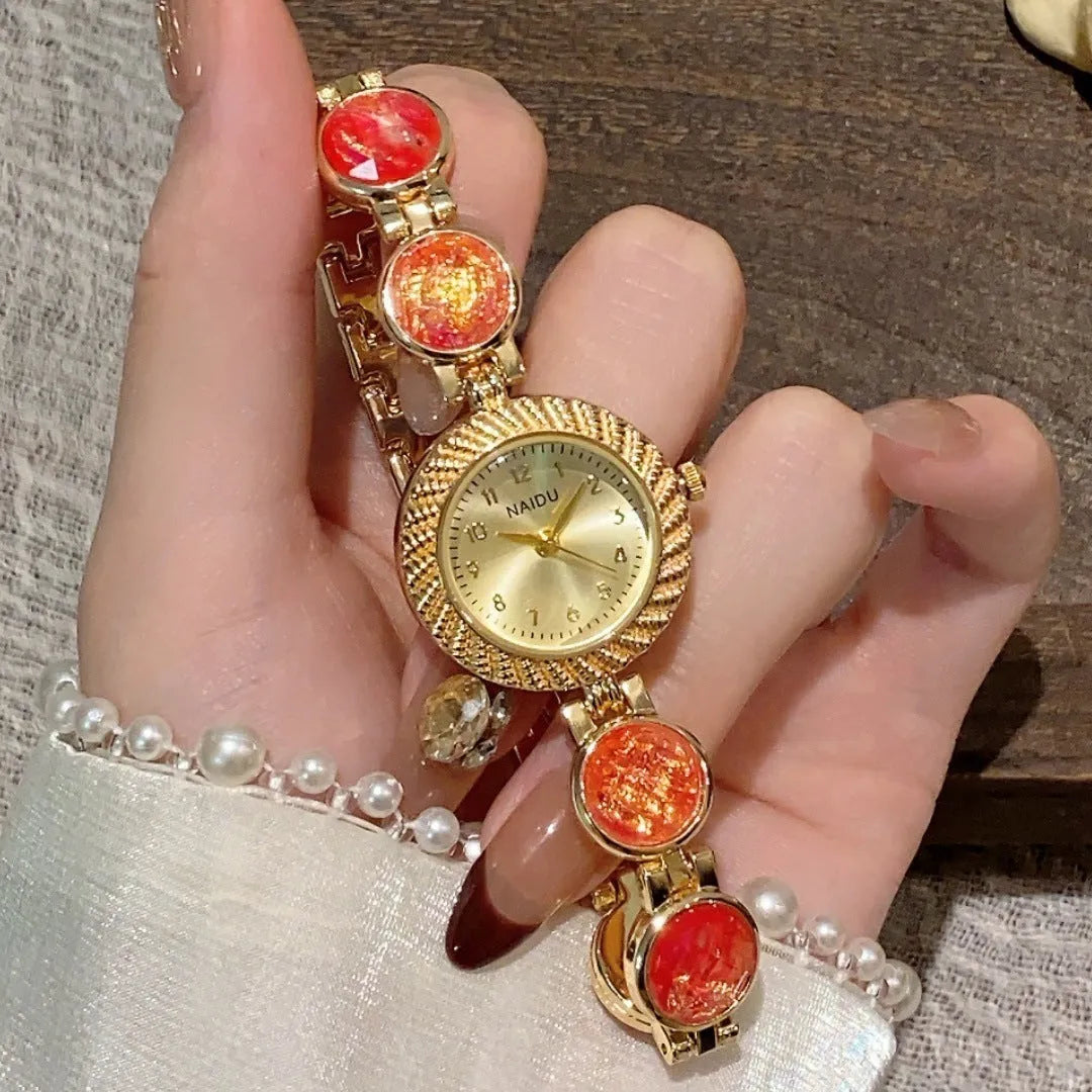 Women's round 25mm quartz watch with zinc alloy case in one of six colour options.
