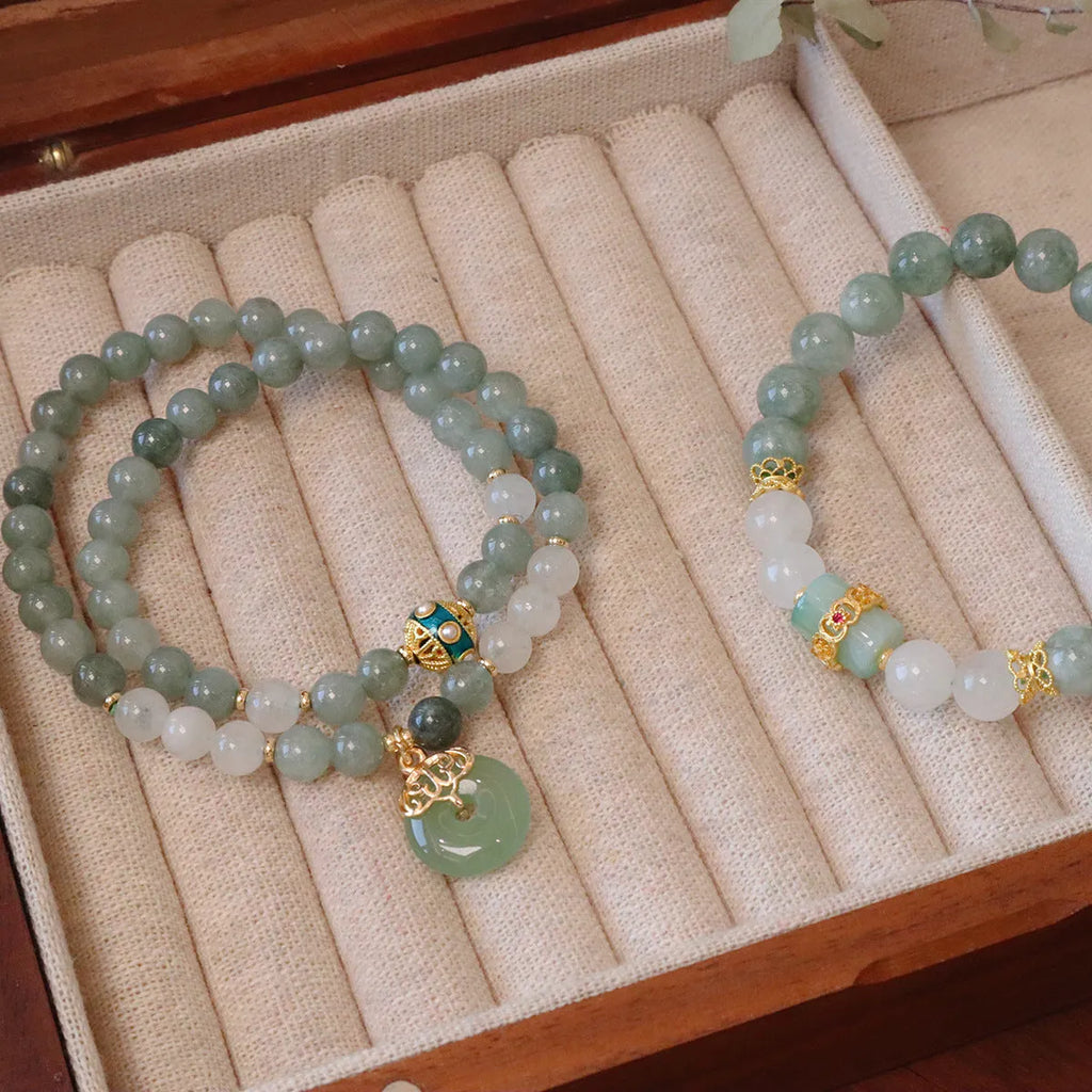 Myanmar jade safety buckle bracelet with geometric peace buckle charm on wrist