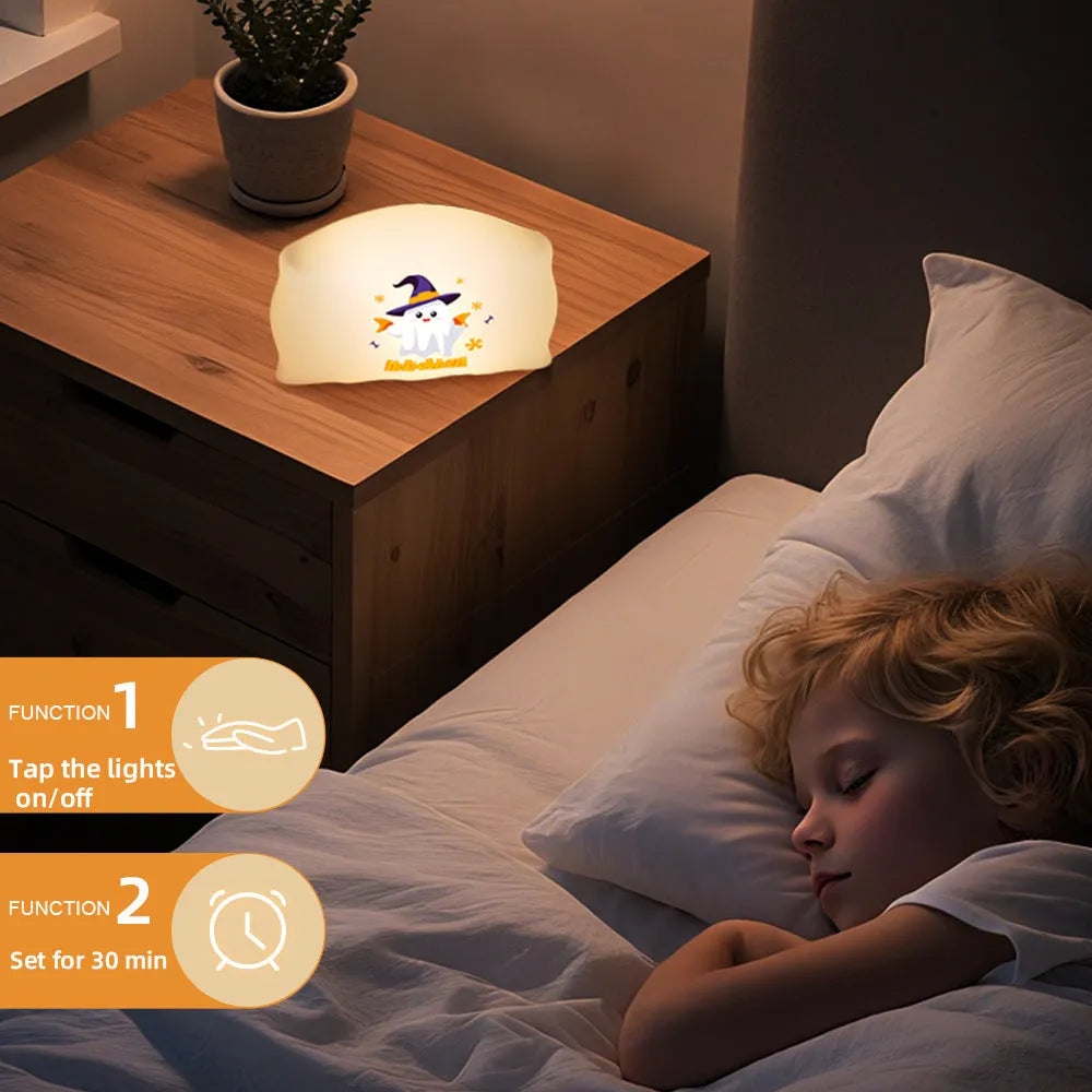 Small cartoon ghost Halloween doll table lamp with warm LED light, shown in Magic Ghost and Pumpkin Ghost colours.