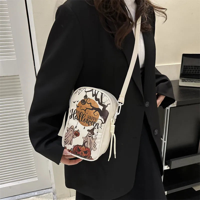Women's Halloween graffiti print crossbody bag with pumpkin ghost bat cartoon design in black PU material