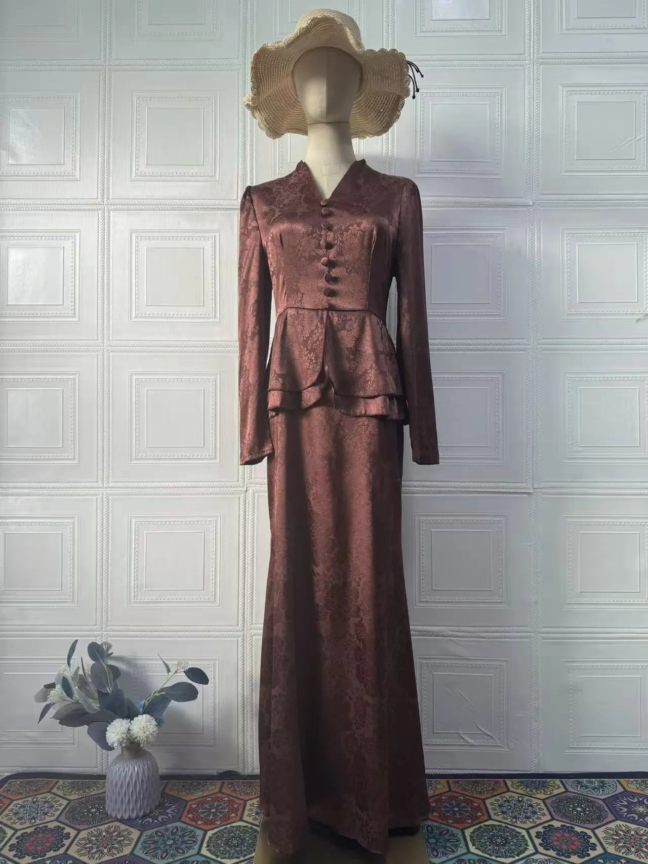 Dark brown artistic retro long dress with plant pattern, long sleeves, and a fake two piece design.