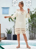 Apricot hand-crocheted long beach dress on a model, showing textured acrylic fabric
