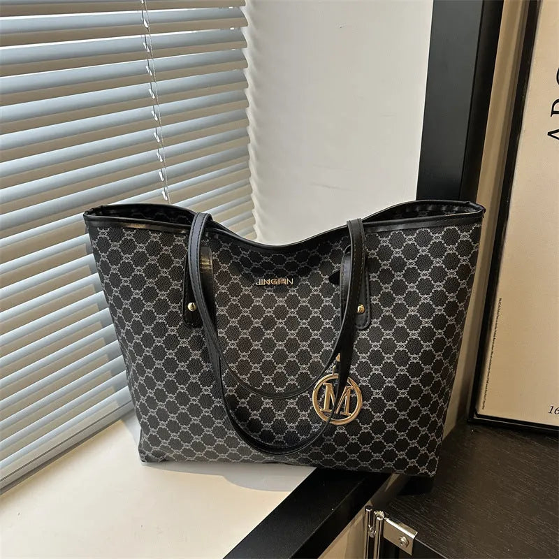 Black PU street style shoulder bag with visible stitching, shown next to grey, white, and brown colour options.