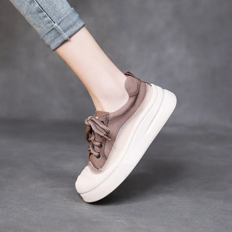 Women's brown leather lace-up casual shoes with round toe on white background