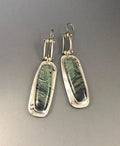 Two-tone marble pattern geometric drop earrings with alloy construction, front and side views