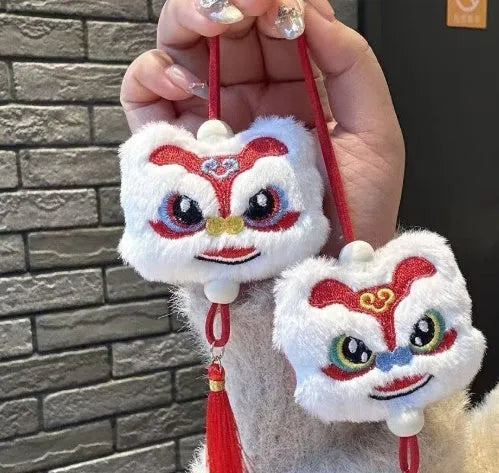 Chinese style blue and yellow plush lion keychain ornament with star stone decoration and cartoon styling