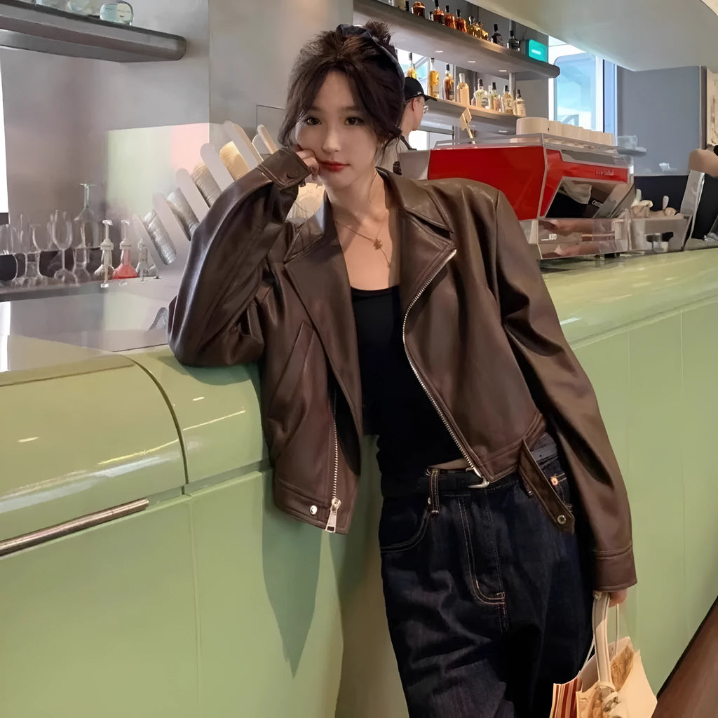 Women's brown retro slim fit leather jacket with regular sleeves and pocket details
