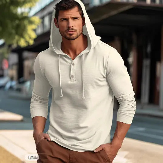 Man wearing a dark blue cotton pullover hoodie with long sleeves, showing front view.