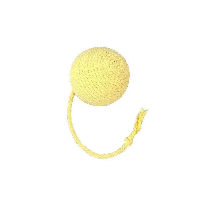 Cat toy ball with rope attached in green, pink, purple, or yellow colours with internal bell