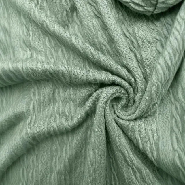 Green women's loose fit hooded sweater coat with a front zip closure on a hanger.