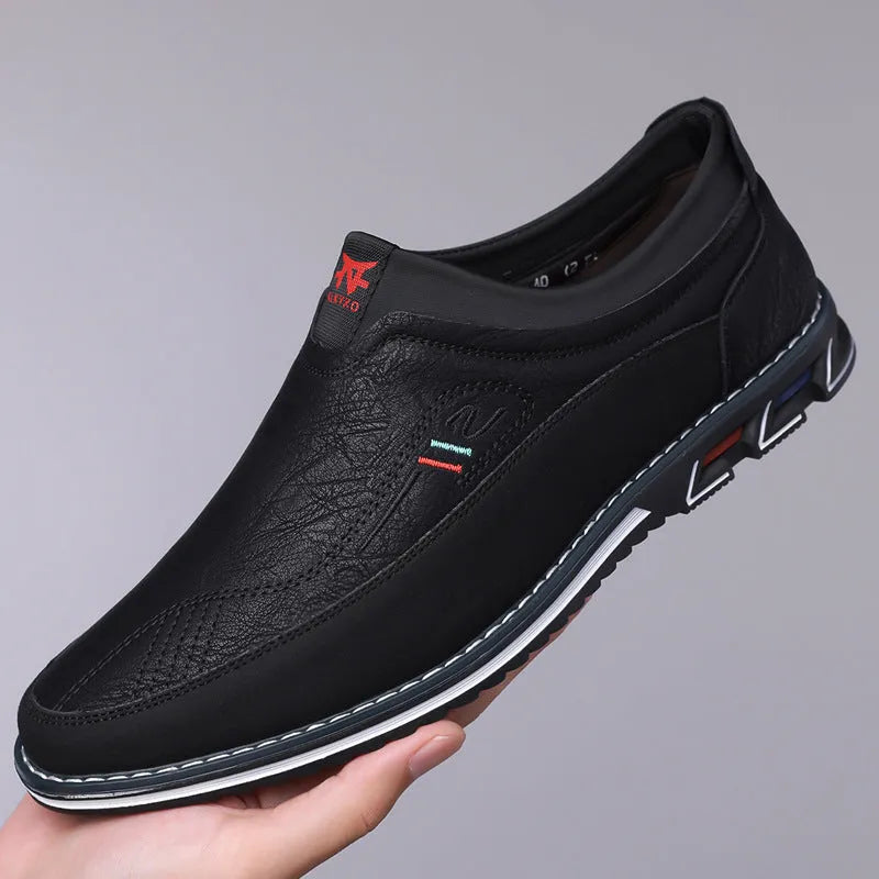 Men's low-top casual leather shoes with a fabric upper, leather toe cap, and rubber sole in orange colour.