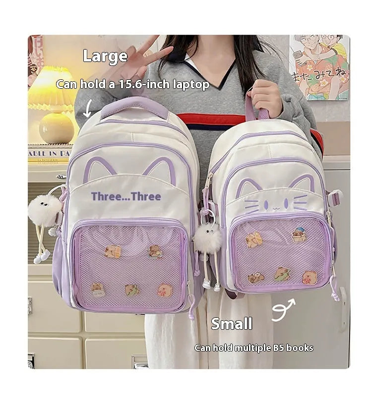 Cartoon style large capacity nylon backpack in pink with badge pendant, showing curved shoulder straps
