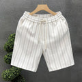 Men's black and white striped casual shorts with fleece lining and elastic waistband