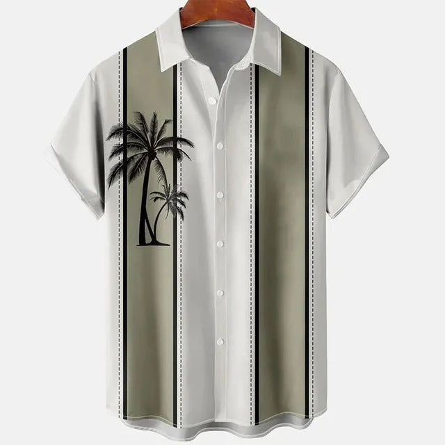 Man wearing a slim fit short sleeve shirt with a colourful 3D floral beach print.