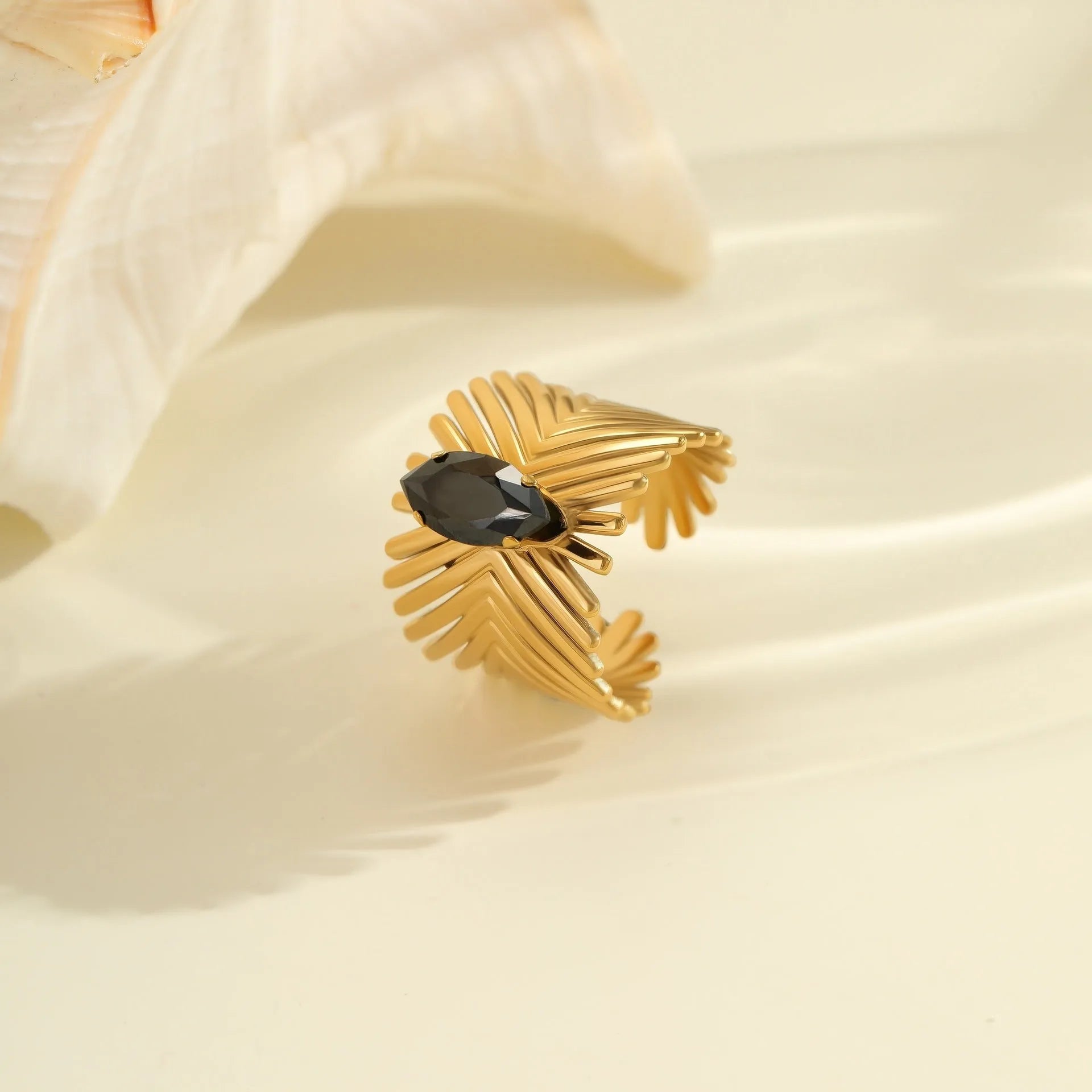 Open mouth geometric titanium steel ring with inlaid zircon stones showing adjustable free size design