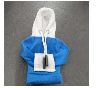 Universal cotton gear knob cover hoodie in blue with adjustable drawstring on a car shift knob