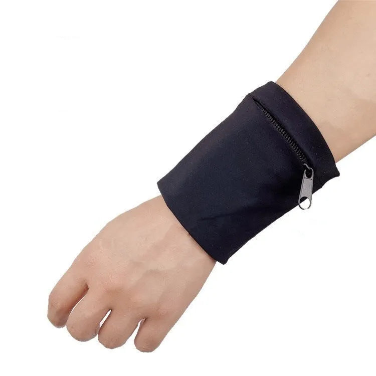 Black armband wallet with adjustable strap and 10x10.5cm phone compartment for running and hiking.