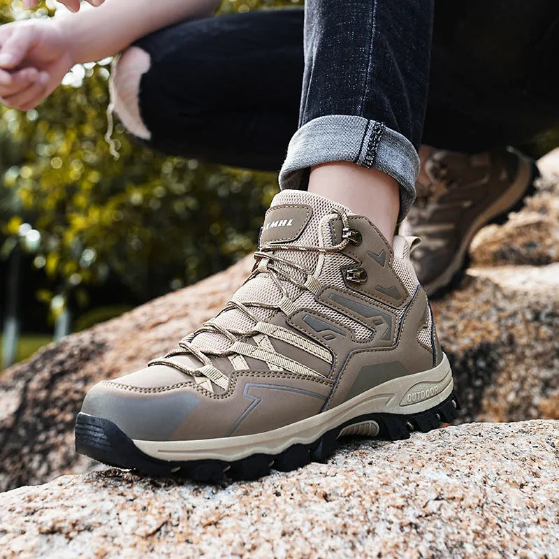 Low-top hiking sneakers in multiple colours with rubber sole and lace-up front for outdoor wear.