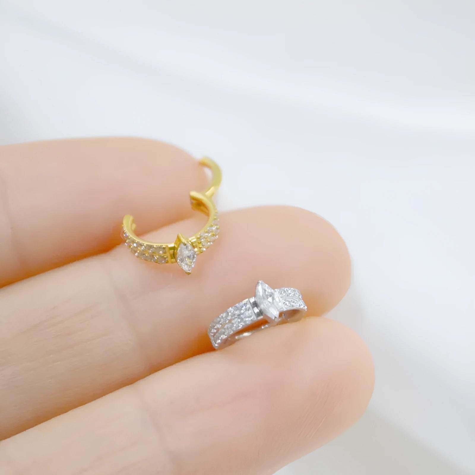 Ladies titanium steel heart-shaped zircon earrings with diamond treatment in silver or gold colour measuring 1.2x8mm