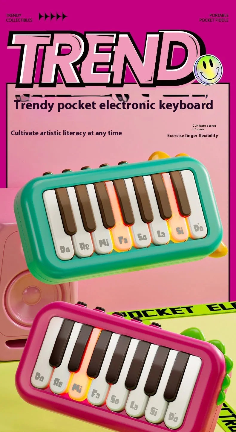 Baby pocket electronic keyboard with little piano pattern in green plastic design