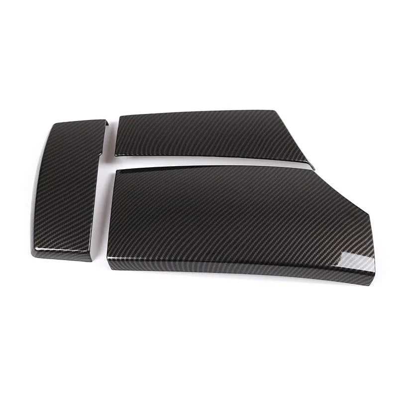 Black ABS carbon fibre pattern armrest protective cover set for car centre console, three pieces shown.