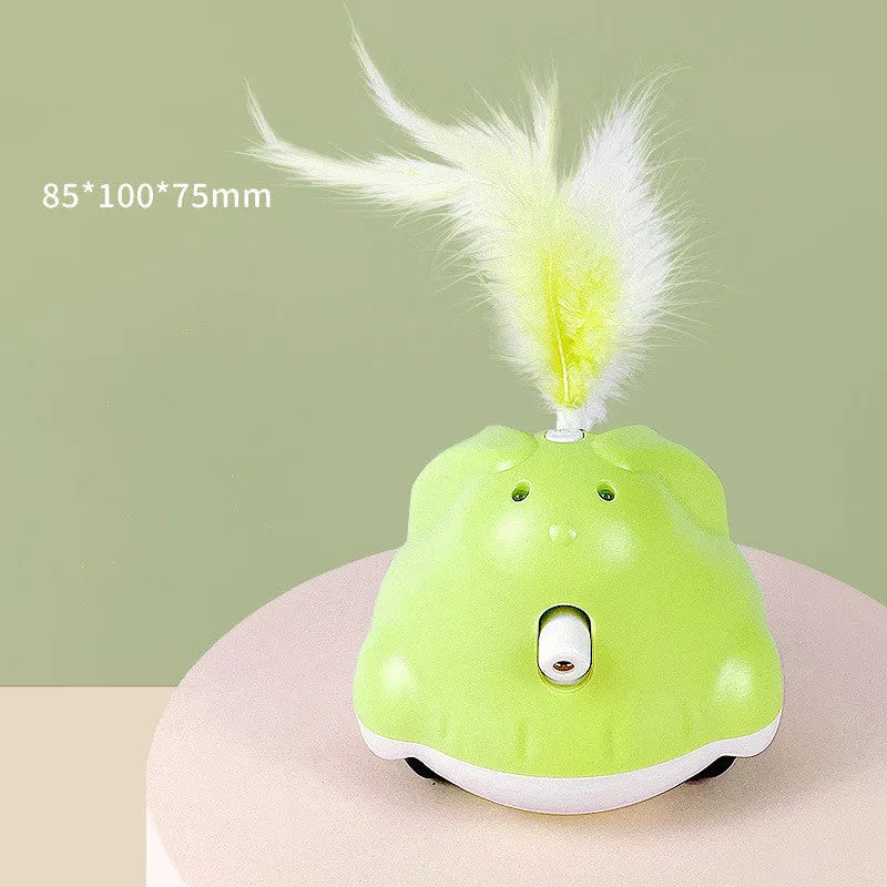Green USB rechargeable electric cat teaser with rabbit design, infrared laser, and feather attachments on a floor
