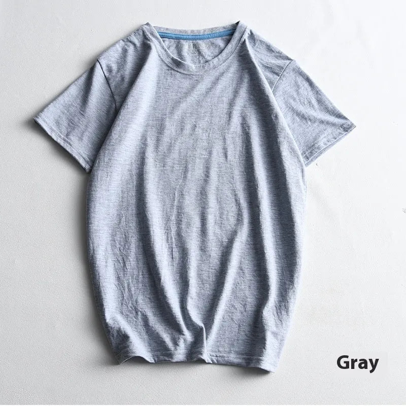 Men's solid colour round neck cotton T-shirt on a hanger, showing short sleeve and casual pullover style.